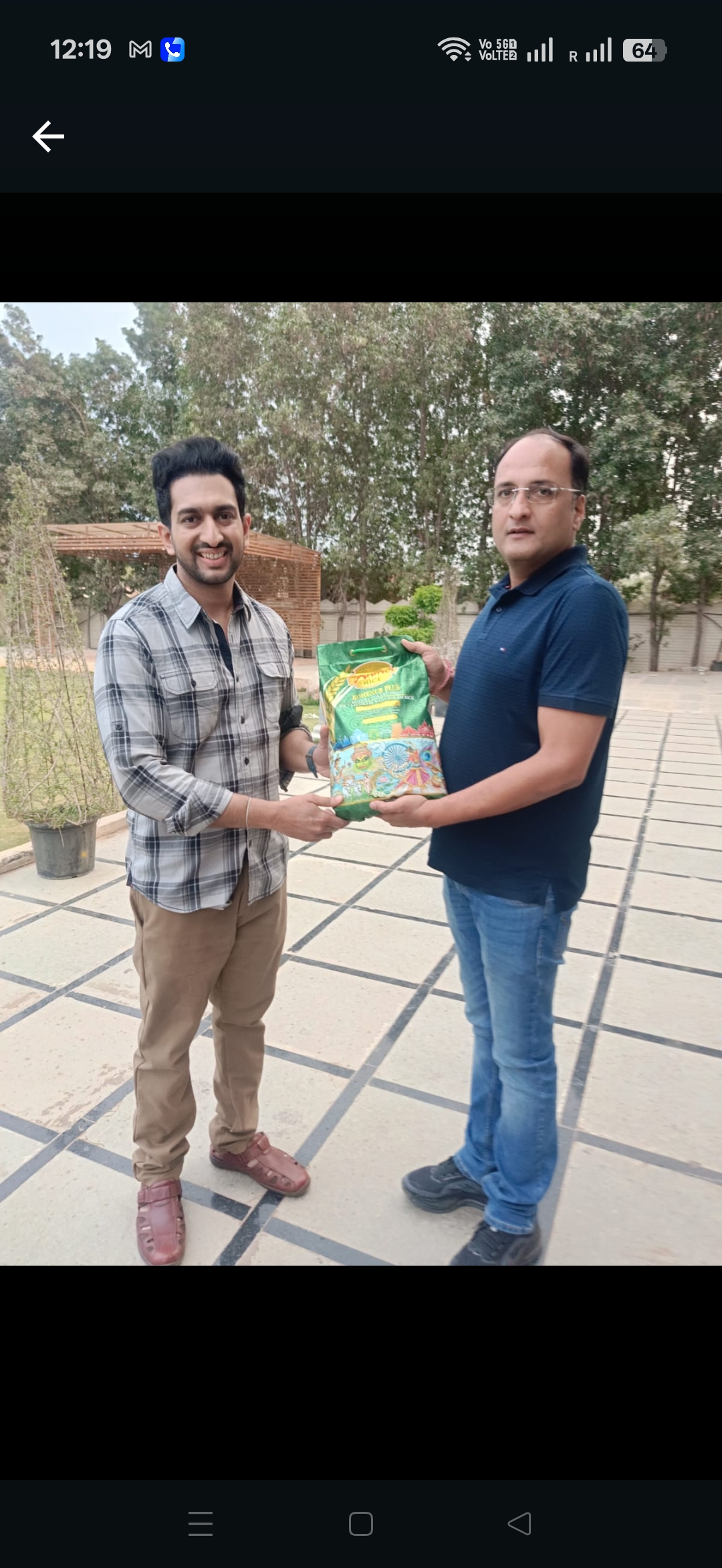 Rohit with the Managing Director of the Anmol Group